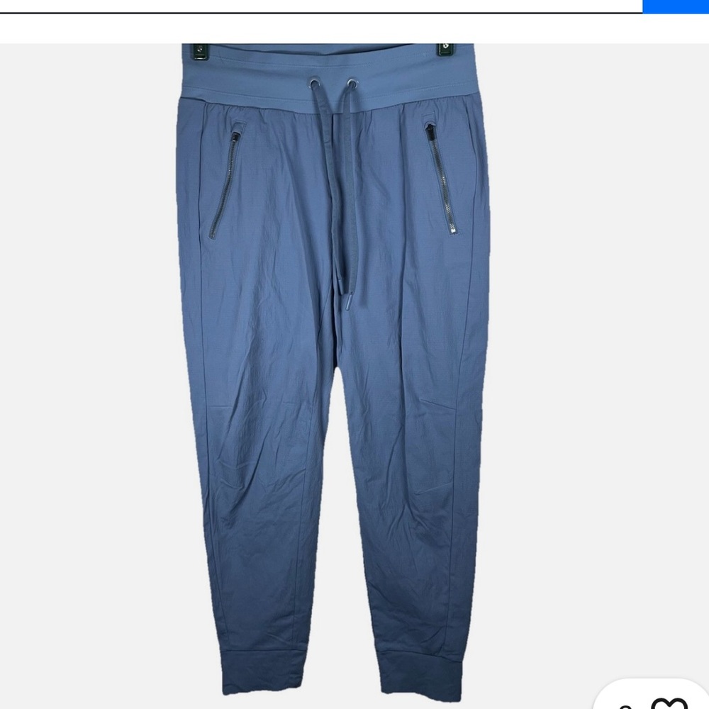Athleta Trekkie North Jogger pants in a cottage or dusty blue color.